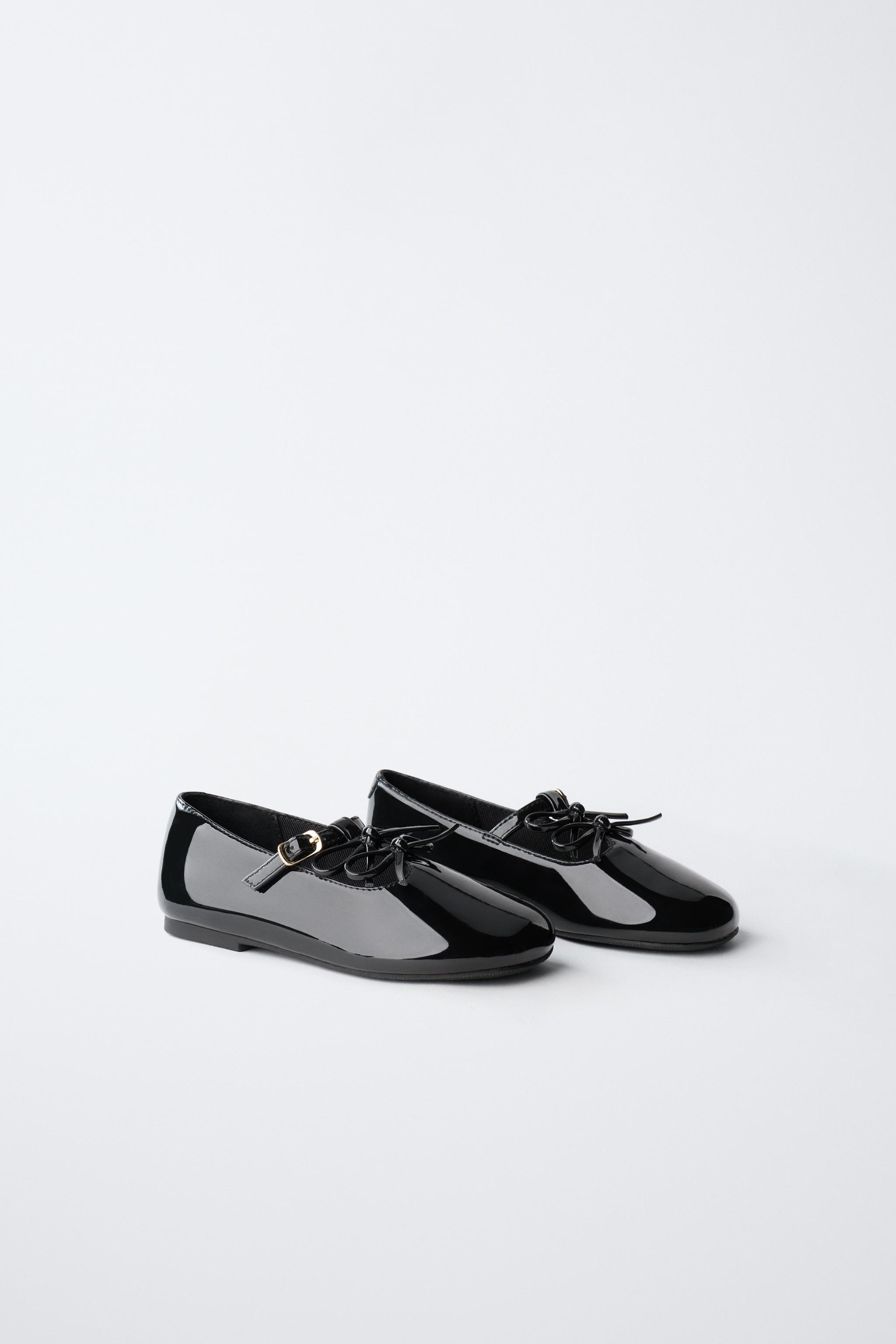 PATENT LEATHER BALLET FLATS WITH BOWS